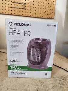 lot 517 image: New In Box Pelonis 1500W Ceramic Space Heater Small Room Size Model 100247636