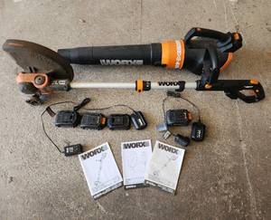 lot 488 image: WORX 20V Cordless String TrimmerEdger with 6 Batteries and Charger (All Power On)