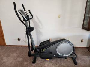 lot 9 image: Golds Gym 410 Elliptical Machine with iPod Compatibility