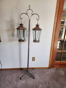 lot 27 image: 63in Tall Decorative Metal Double Lantern Floor Stand with Glass Panels