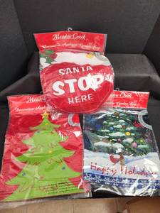 lot 703 image: Christmas Decorative Garden Flags Set - Santa Stop Sign, Tree, Holiday Scene