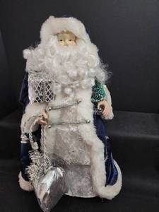 lot 706 image: Decorative Santa Claus Figure in Navy Blue and White Fur Coat 20in
