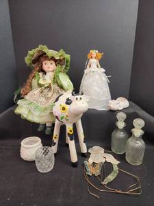 lot 713 image: Home Decor - Porcelain Dolls, Glass Bottles, and Figurines