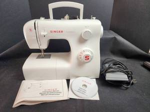 lot 721 image: Singer Tradition Sewing Machine with Manual and Accessories