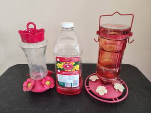 lot 765 image: Perky-Pet Hummingbird Feeders with Nectar Bottle Set