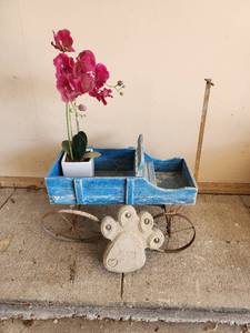 lot 770 image: Decorative Blue Wooden Cart Planter with Paw Print Accent