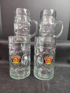 lot 211 image: Paulaner Munchen Beer Steins - Set of 4 Glass Mugs