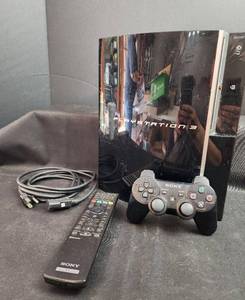 lot 219 image: Sony PlayStation 3 CECHL01 Console with Controller and Remote - Powers On