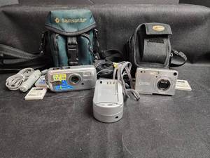 lot 225 image: Pentax Optio Digital Camera Lot with Cases and Accessories