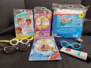 lot 242 image: Kids Swimming Pool Accessories - Floats, Goggles, and Inflatables