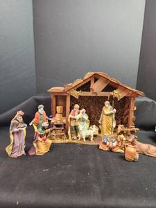 lot 256 image: Complete Nativity Scene Set with Wooden Stable and Figurines