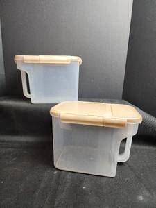 lot 70 image: Clear Plastic Storage Containers with Tan Lids