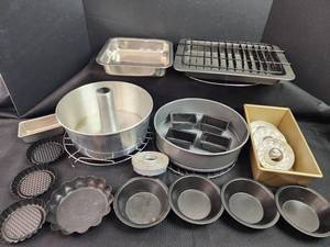 lot 107 image: Baking Pan Collection - Angel Food Cake Pan, Tart Pans, Mini Loaf Set