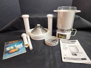 lot 133 image: Presto TaterTwister Electric Curly Cutter and Blooming Onion Maker with Manual and Cookbook