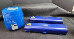 lot 143 image: Cooks Essentials Digital Rice Cooker and Kuhn Rikon Swiss Design Kitchen Wrap Dispensers