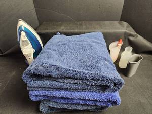 lot 804 image: T-fal UltraGlide Steam Iron with Blue Cotton Bath Towels
