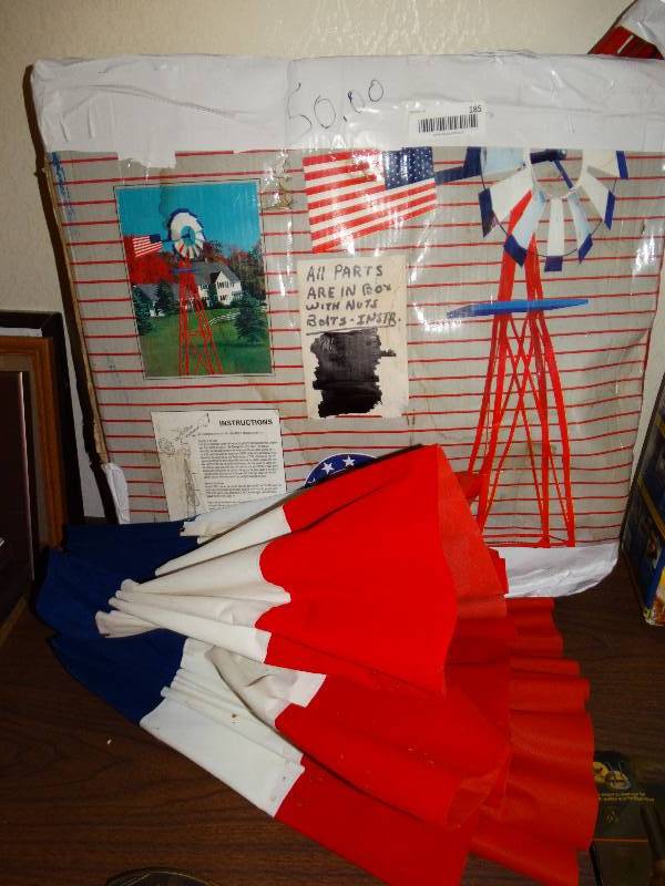 lot 185 image: 8ft patrriotic- metal windmill and decor bunting