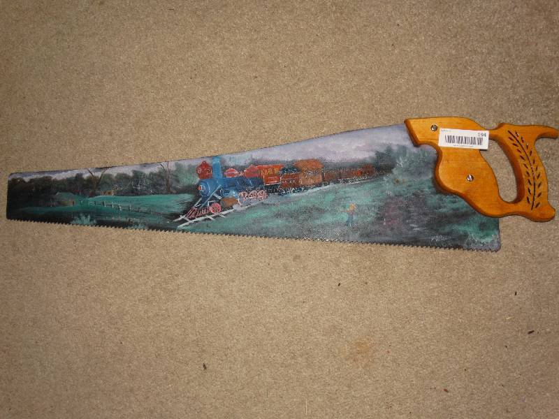 lot 194 image: Painted saw