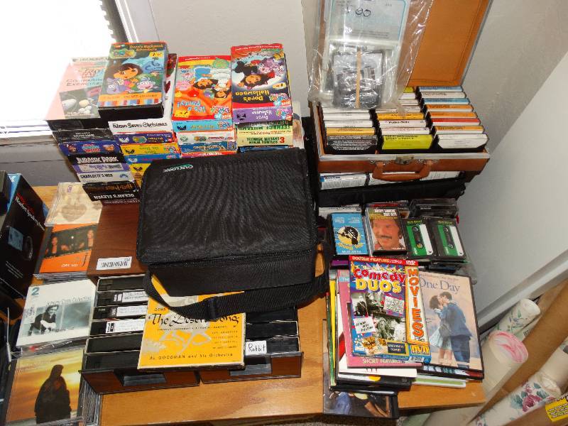lot 212 image: Large lot of VHS, DVDs, CDs and cassettes with storage boxes