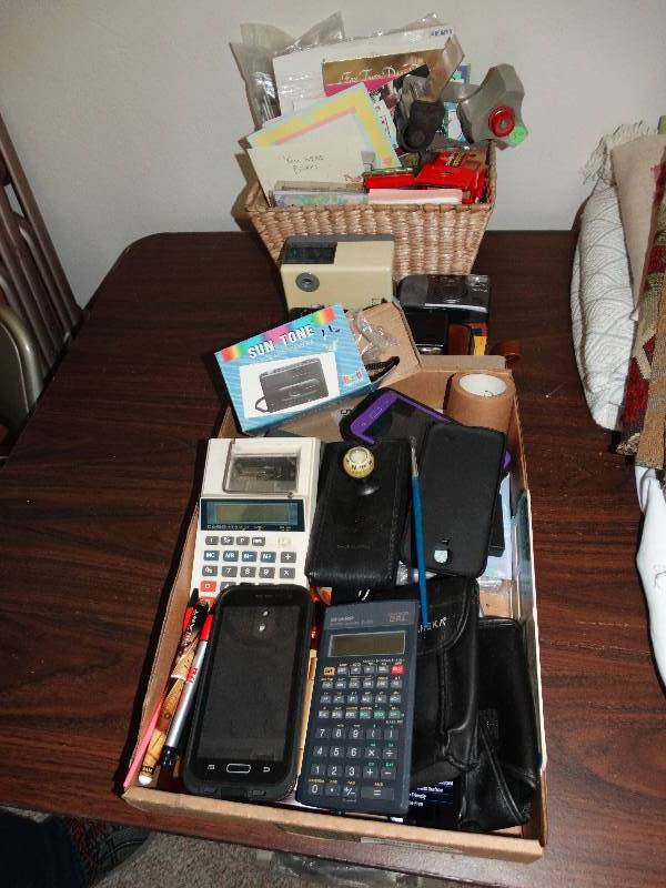 lot 220 image: Calculators, office supplies, greeting cards and cameras