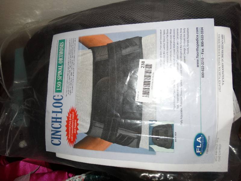 lot 238 image: Vintage overdoor traction kit and cinch-loc back brace