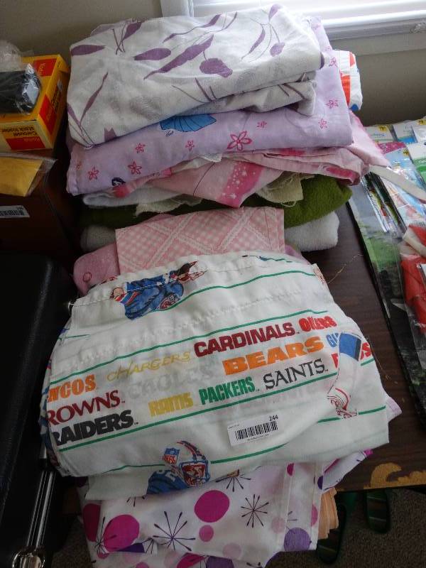 lot 244 image: Lot of bedding and blankets