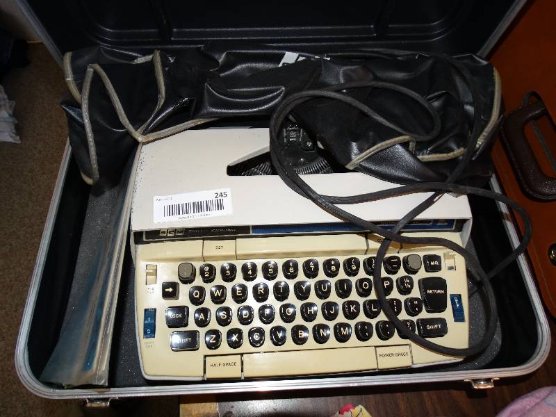 lot 245 image: Vintage smith corona type writter in case