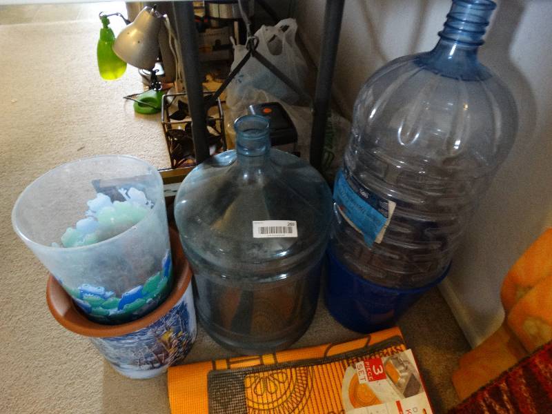 lot 269 image: Planters, trash cans, water jugs and lot of kitchen mats