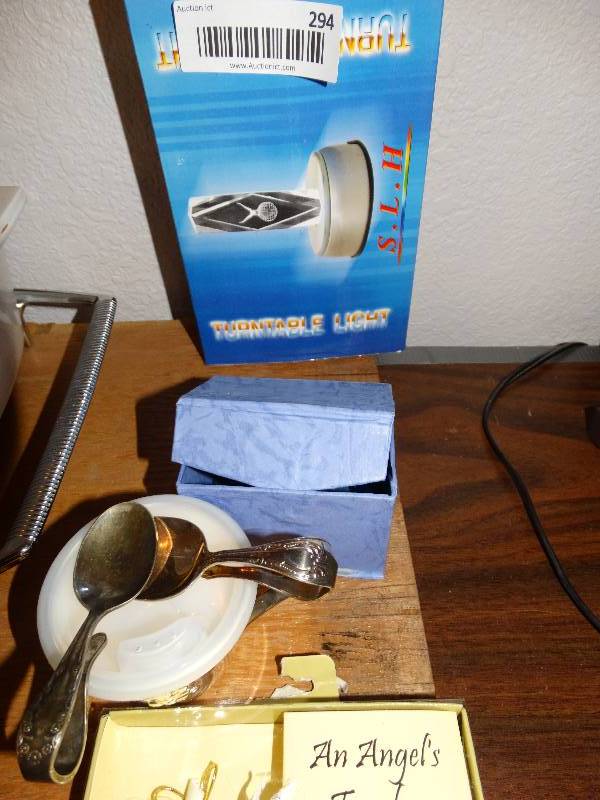 lot 294 image: Turntable light laser Angel baby spoons brass decor