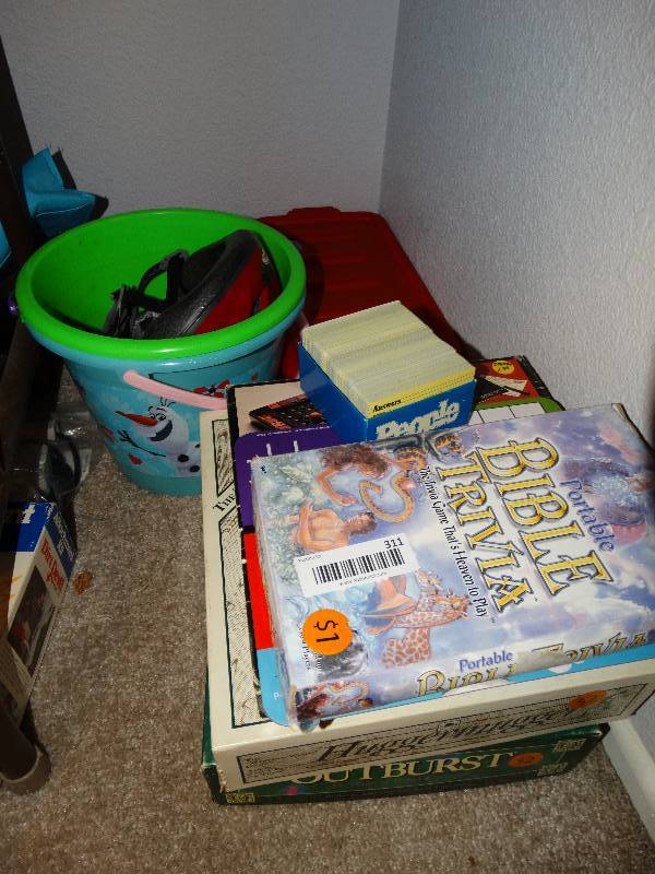 lot 311 image: Board games bike helmet toys sand pails misc.