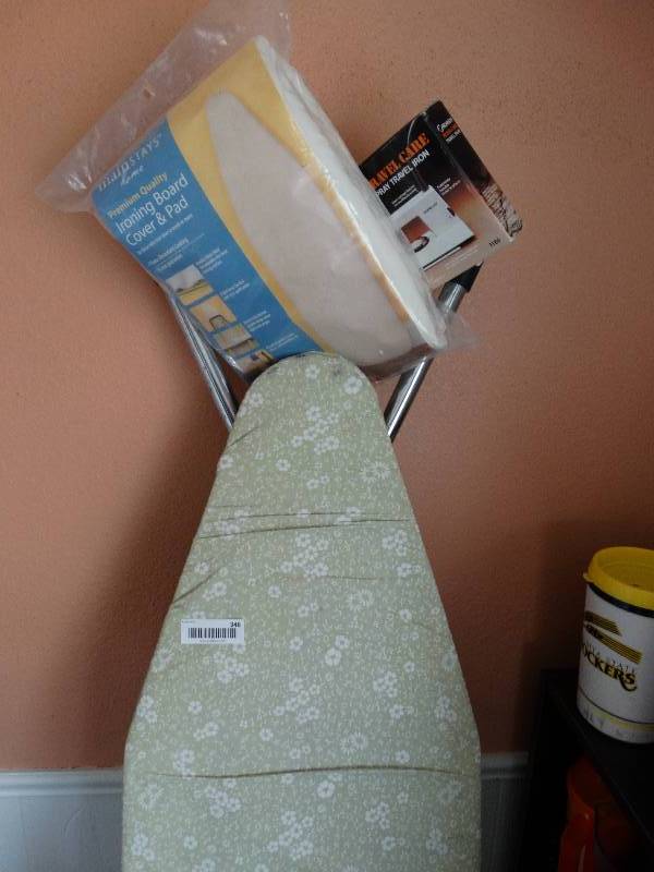 lot 348 image: Ironing board, cover, travel iron, singer skirt marker