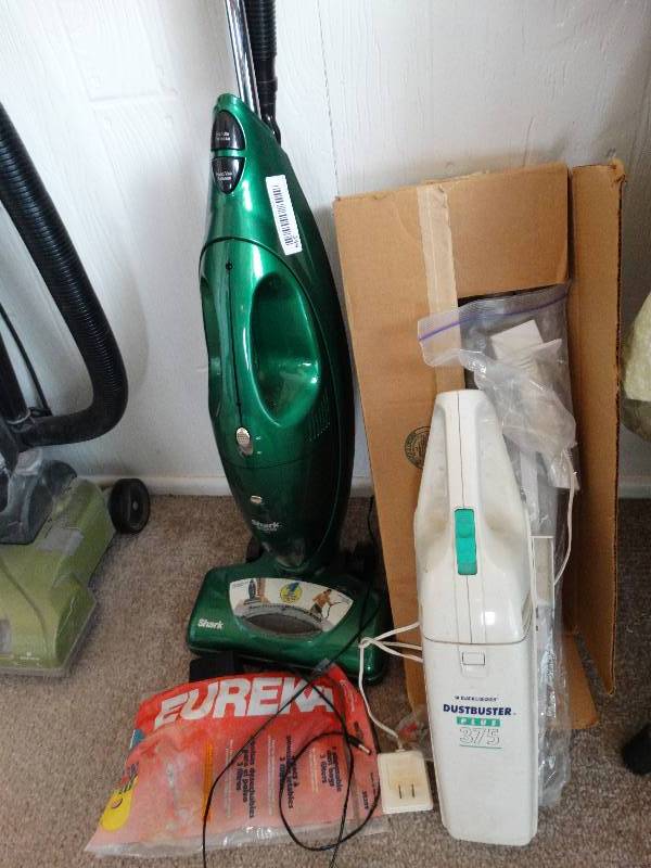 lot 349 image: Dustbuster hand vac, shark cordless vac misc.
