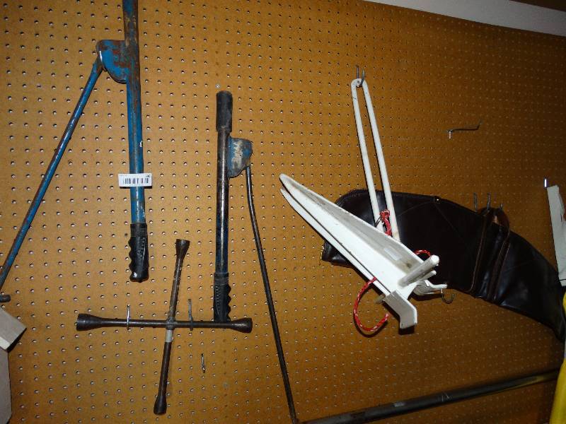 lot 390 image: 2 iron pullers tire iron boat anchor rifle case 3 canes