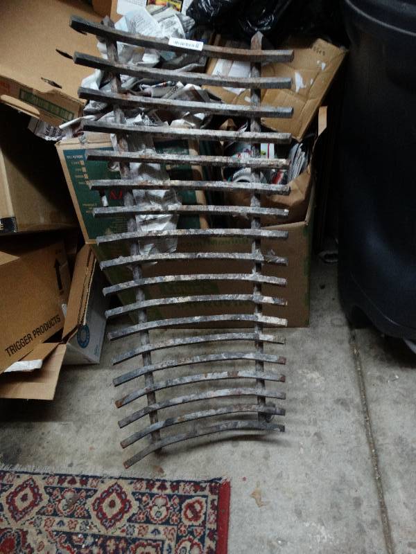 lot 402 image: Large iron fireplace grate