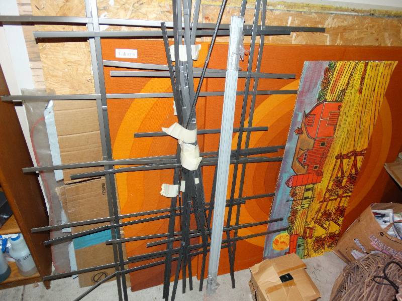 lot 412 image: Metal window grates & 2 large fabric art pcs