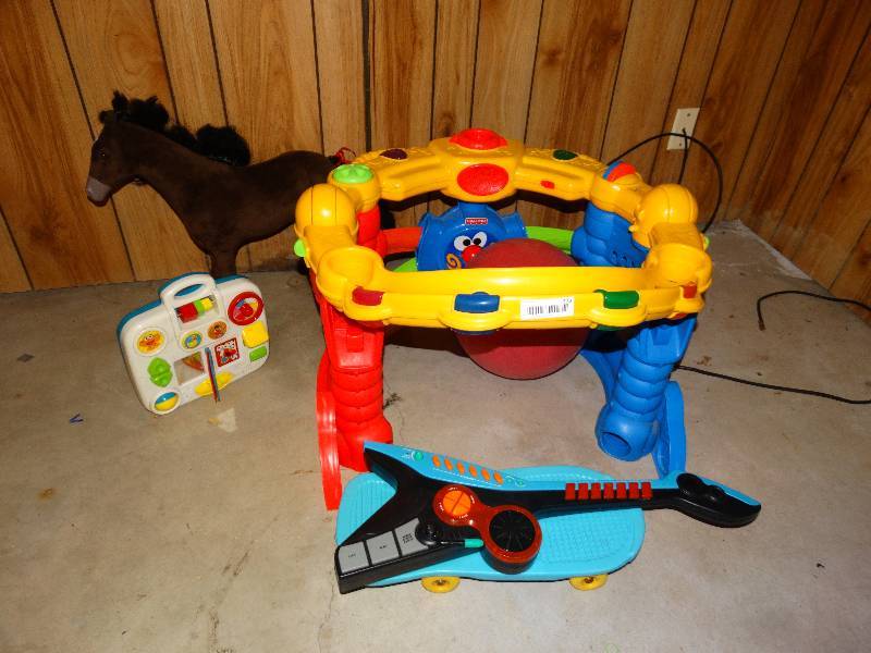 lot 373 image: Children play center, toys. skateboard