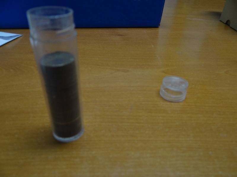lot 119 image: Partial tube of Indian head pennies