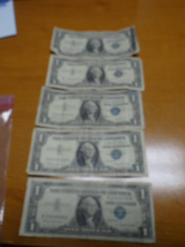 lot 129 image: 5- 1957 silver certificates