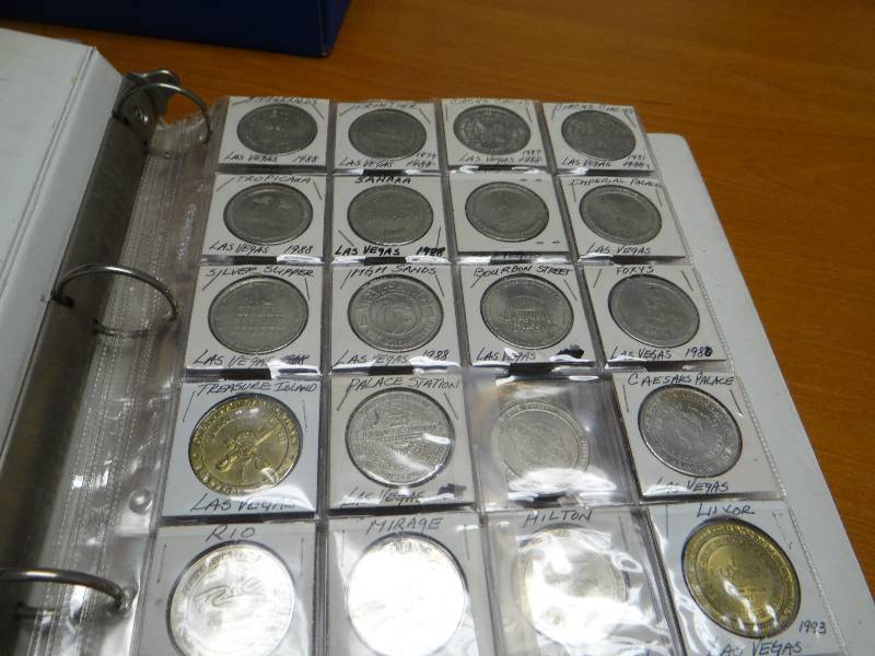 lot 135 image: HUGE collection of 138 various casino coins tokens chips in binder