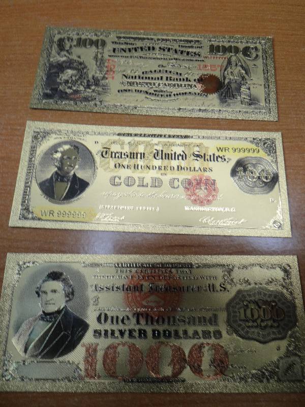 lot 143 image: (3) 24k gold display bank notes in plastic