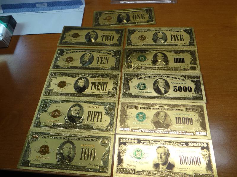 lot 144 image: (11) 24k gold display bank notes in plastic