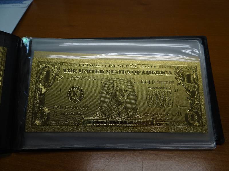 lot 146 image: (7) 24k gold display bank notes in plastic