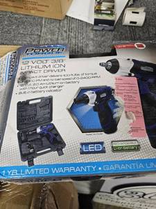 lot 203 image: Power Torque 12volt 38 Lith-ion Impact Driver Ptt0003