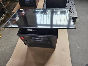 lot 21596 image: Vizio 50in Tv, NavePoint Case W Xbox one, Assorted PS4 games and Controllers