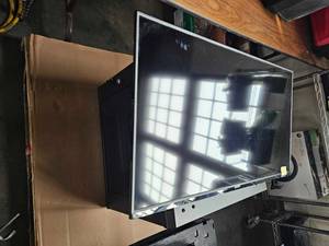 lot 21598 image: Vizio 50in TV W NavePoint Case, Xbox one, ps4, Assorted ps4 games and Controllers