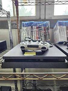 lot 21655 image: Ps4 W Remote and Assorted Games