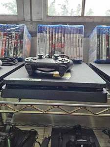lot 21656 image: Ps4 W Remote and Assorted Games