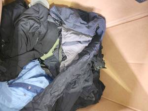 lot 22070 image: Ski Equipment Lot - Jackets, Pants and Boots Collection