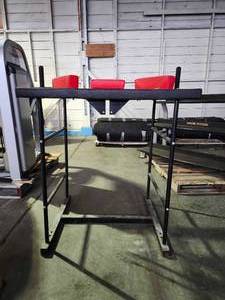lot 22191 image: Professional Arm Wrestling Table with Red Cushions