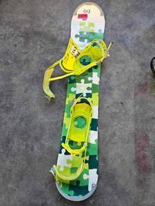 lot 19615 image: Head Snowboard with Rossignol Bindings - Green Puzzle Pattern